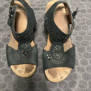 Dansko Black T-Strap Sandals with Laser-Cut Design